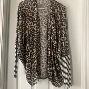 Leopard cardigan with black and white strip sleeves half way down